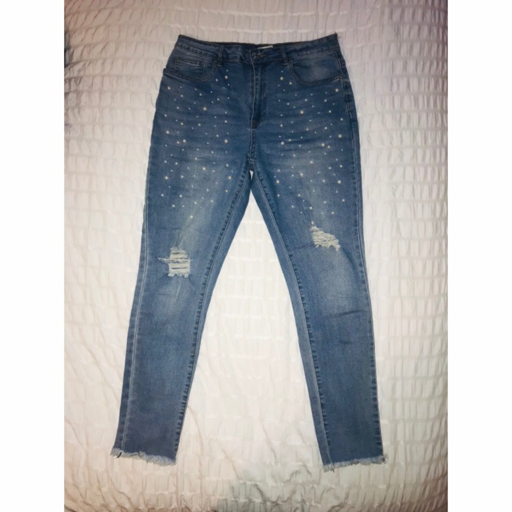 Blue jeans with pearl beading